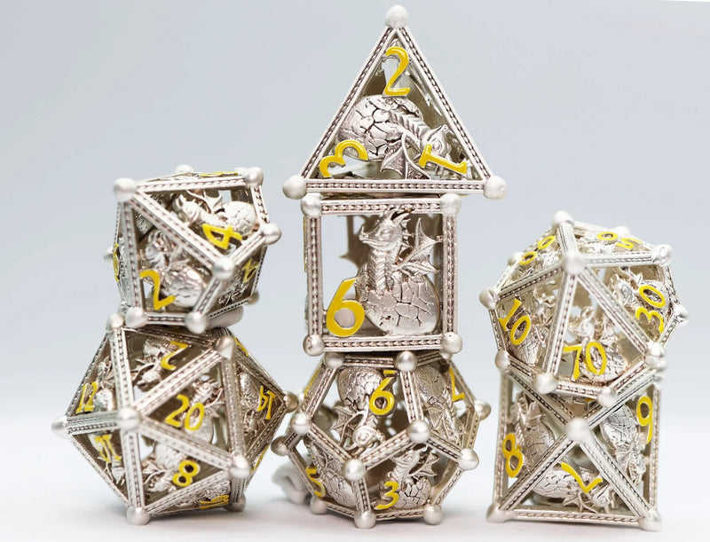 Foam Brain Games RPG Metal Dice Set - Hollow Silver Hatching Dragon